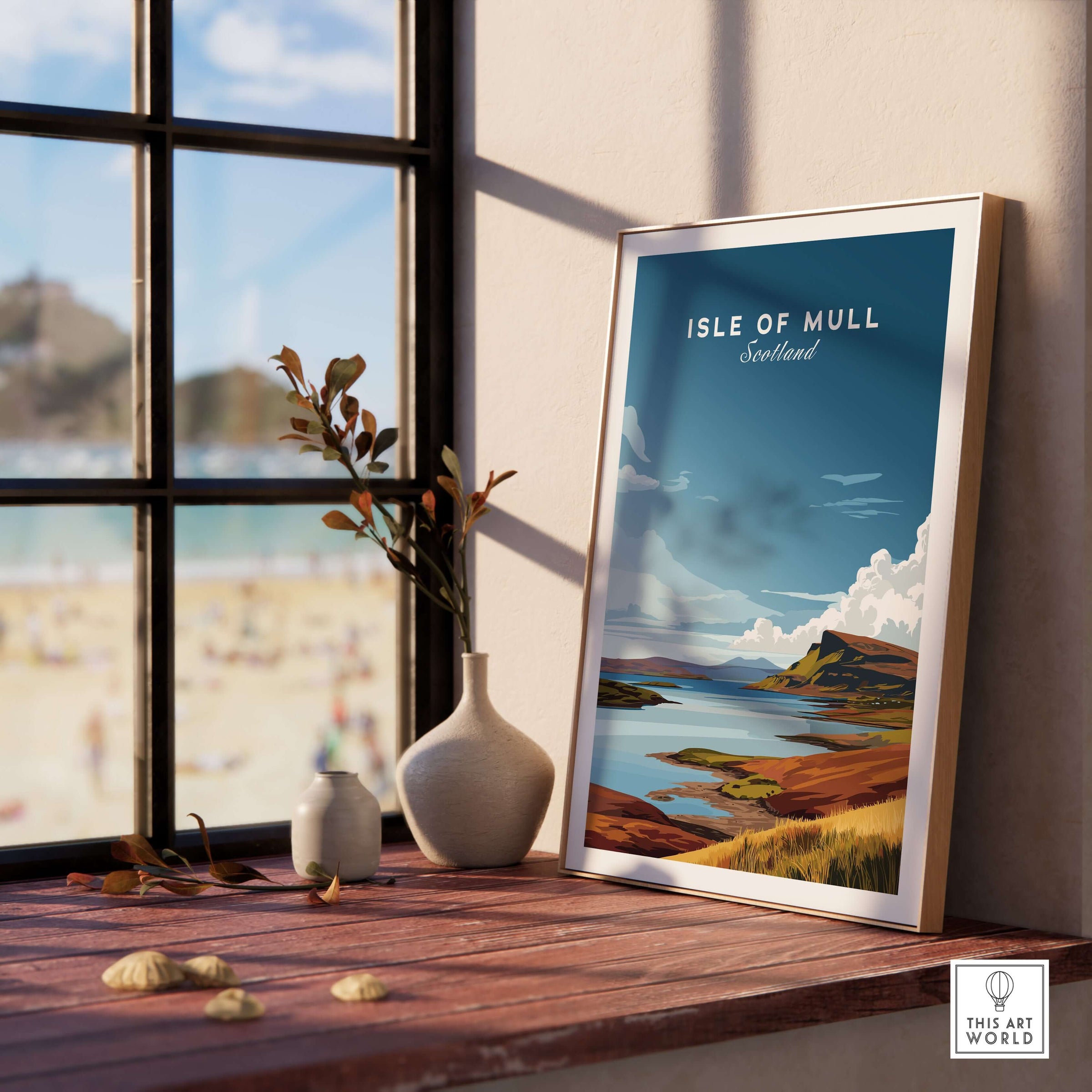 Isle of Mull Scotland Coastal Panorama Poster - Scottish Landscape Print displayed on a wooden table beside a window.
