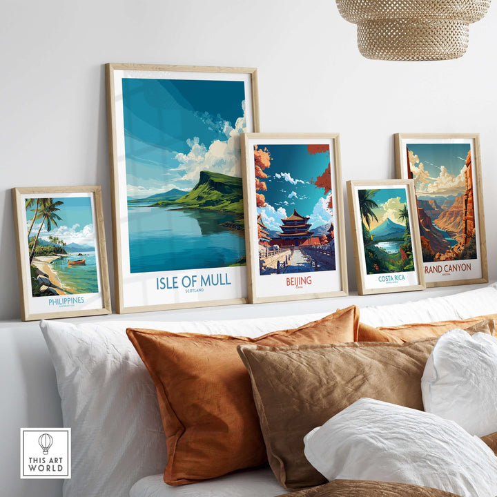 Framed travel prints featuring Isle of Mull, Philippines, Beijing, Costa Rica, and Grand Canyon displayed on a wall.