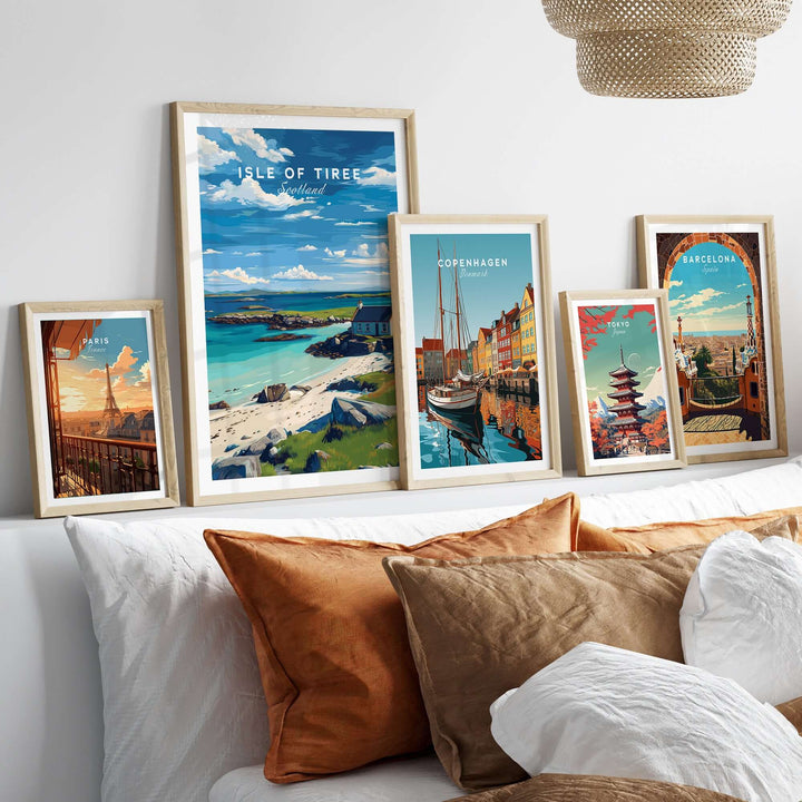 Isle of Tiree Print | Hebridean Island Wall Decor displayed among other travel prints on a cozy sofa.