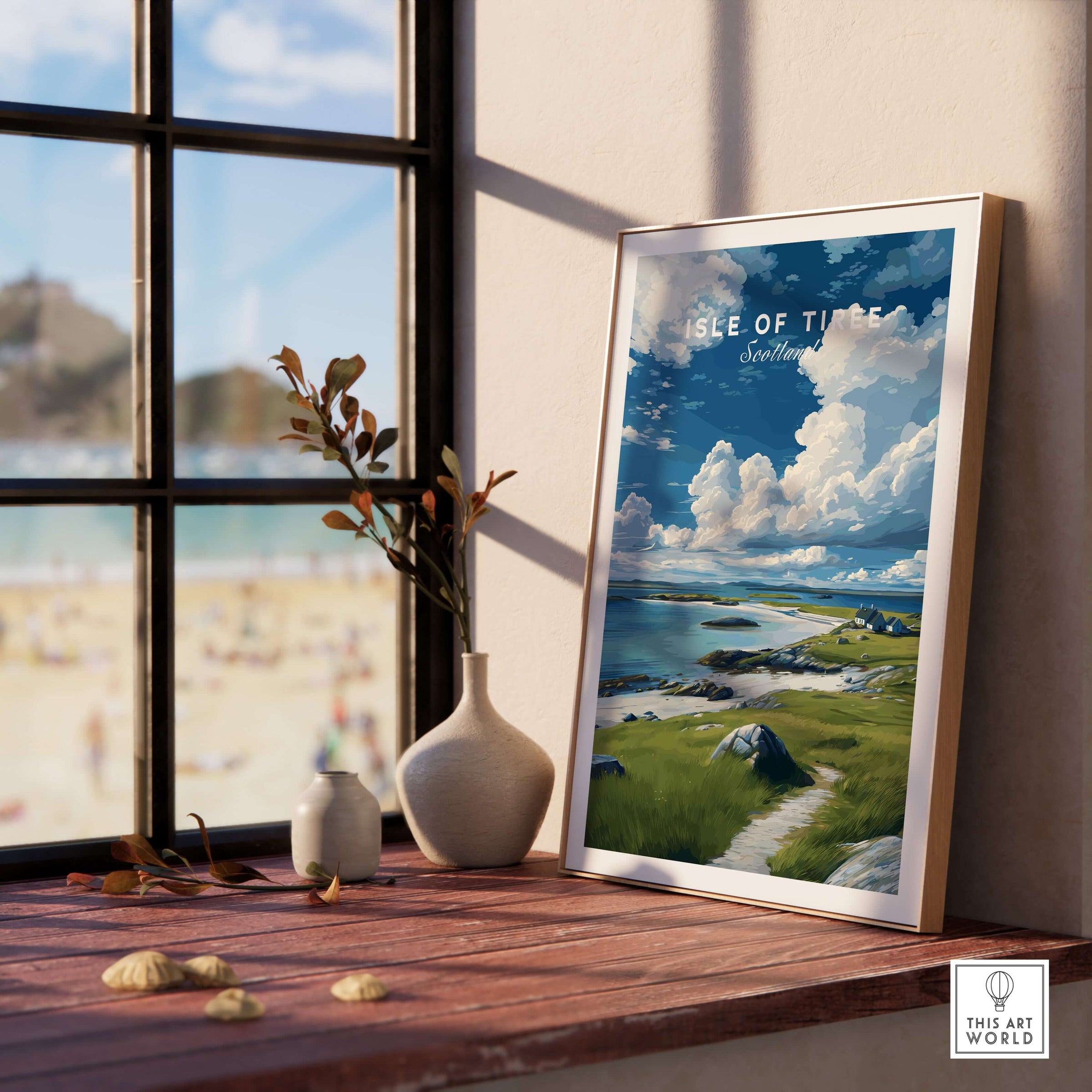 Isle of Tiree Print | Scottish Island Wall Decor framed on a wooden table with coastal view in the background.