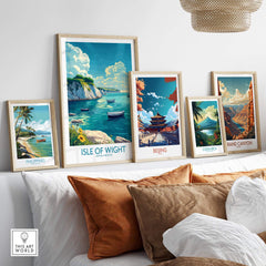 Isle of Wight Art Print displayed among other travel posters, showcasing vibrant landscapes and stunning scenery.