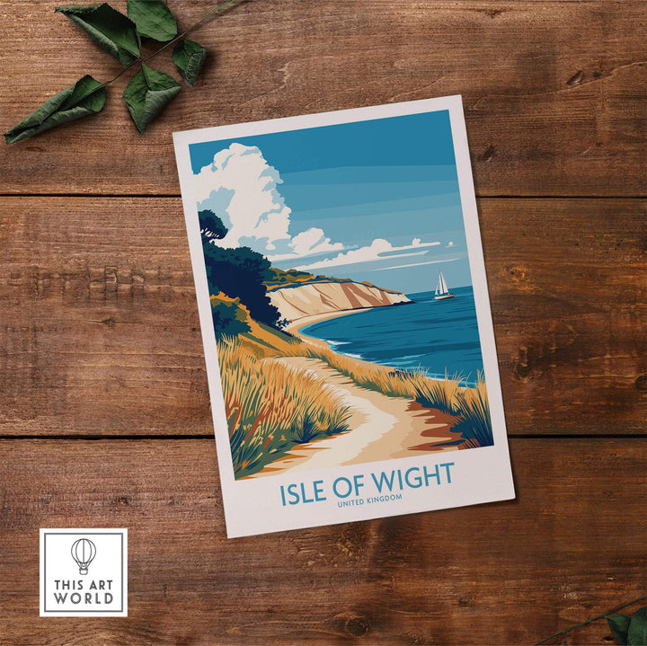 Isle of Wight England poster on wooden table, scenic travel print with coastline and sailboat, perfect decor for UK travel lovers.