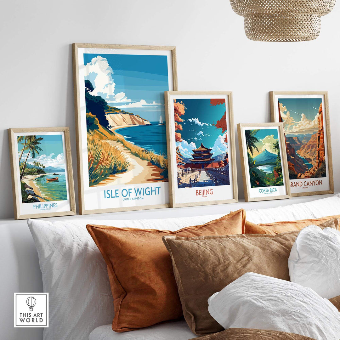 Isle of Wight England poster among other travel prints on a modern living room wall display.