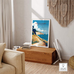 Isle of Wight England Travel Print displayed in a cozy room, showcasing its picturesque coastline and vibrant colors.