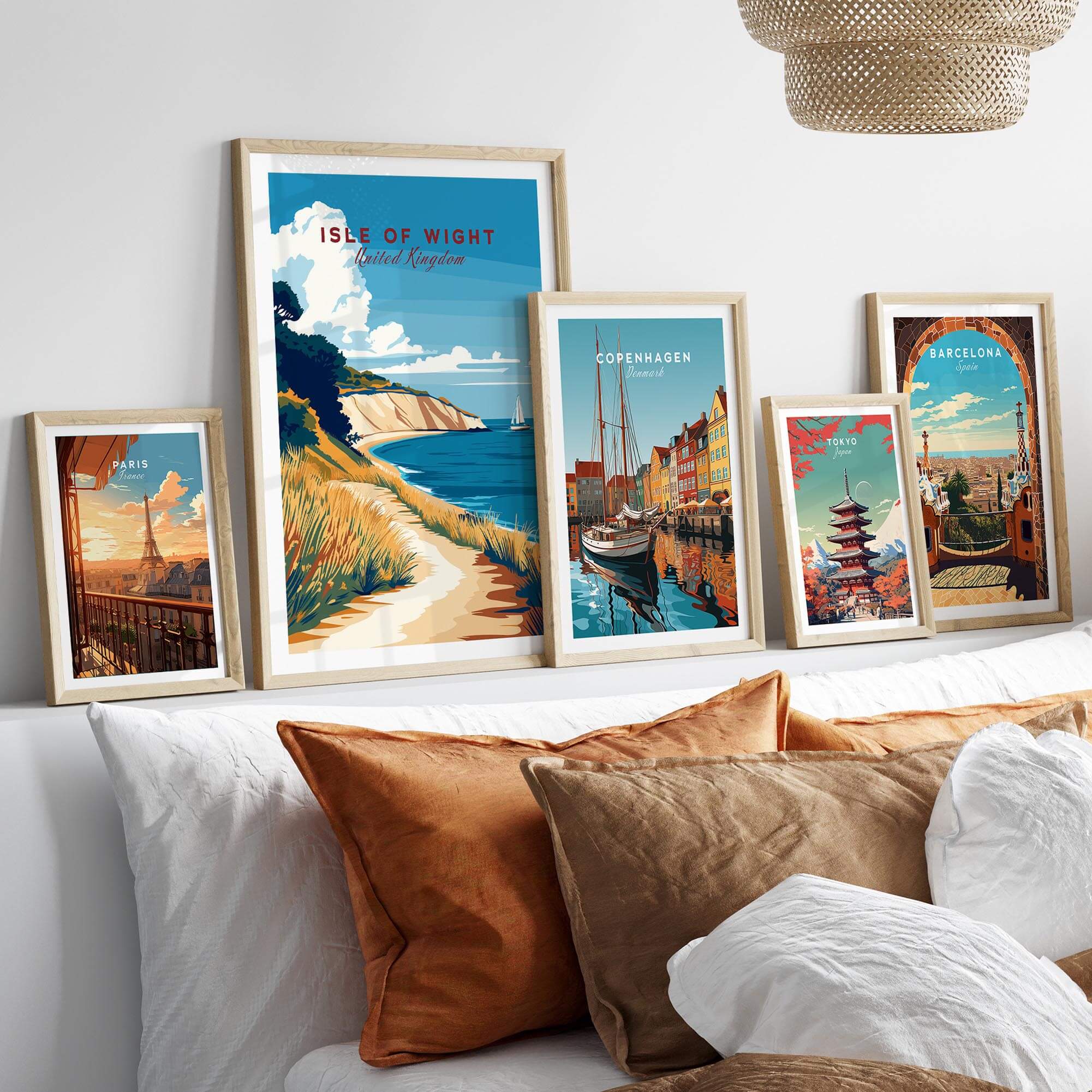 Isle of Wight England Travel Print showcased among other travel prints in a stylish home setting with decorative pillows.