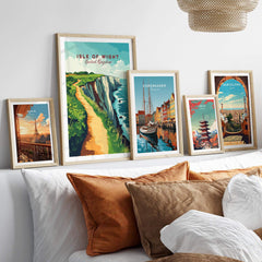 Isle of Wight Wall Art featuring coastal scenes and travel posters in a stylish home decor setting.