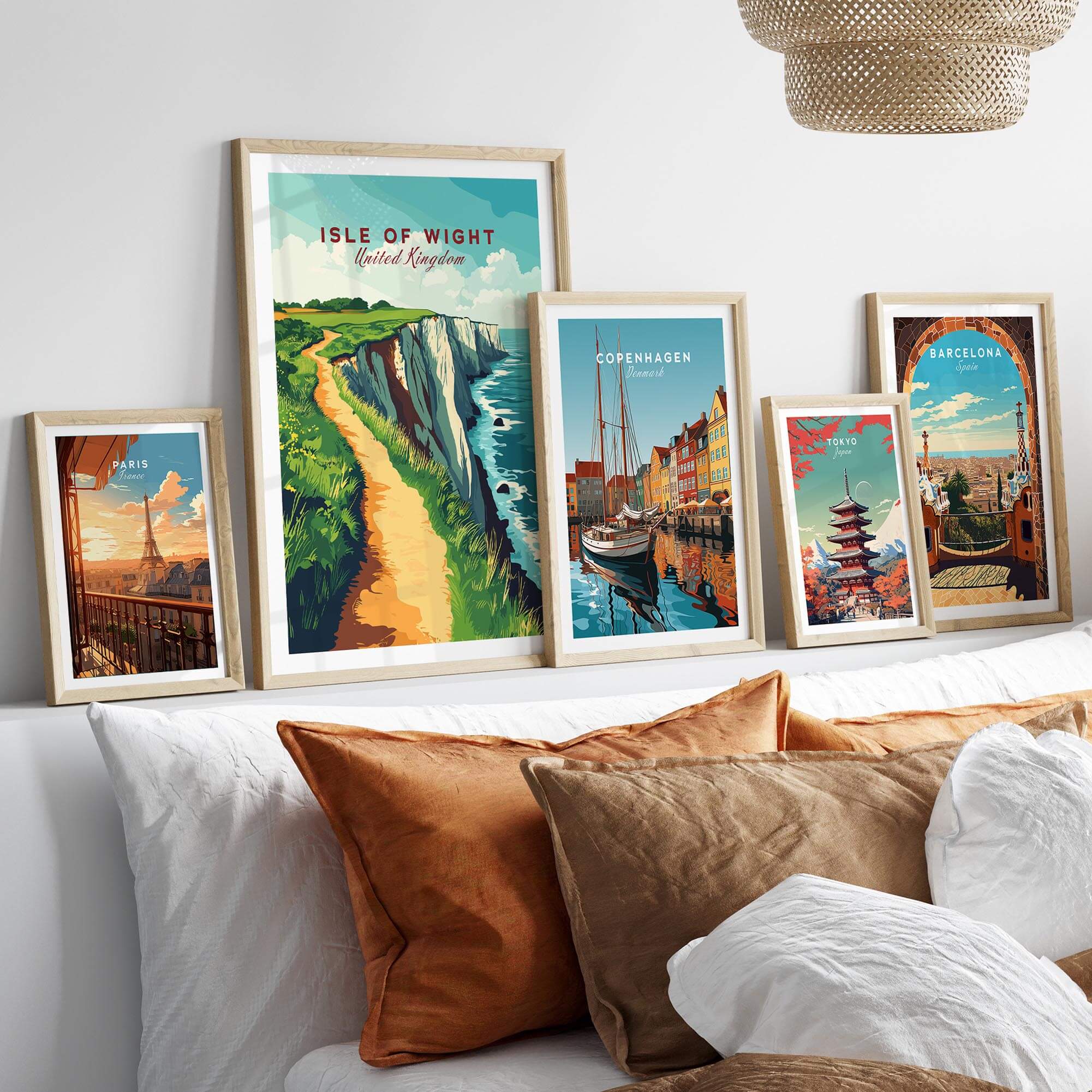 Isle of Wight Wall Art featuring coastal scenes and travel posters in a stylish home decor setting.