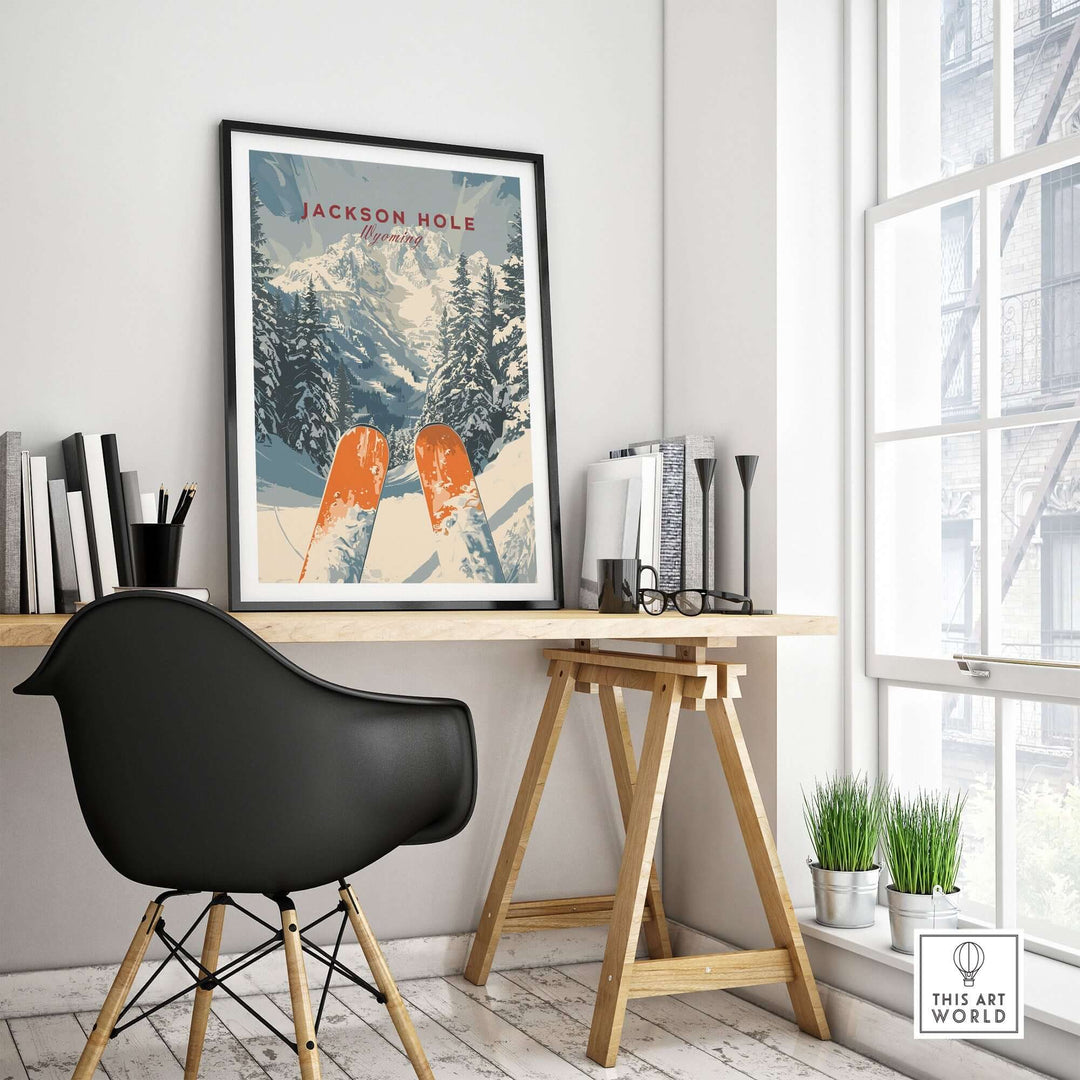 Jackson Hole travel poster featuring stunning ski slopes, decorated in a modern office space with a black chair and natural light.