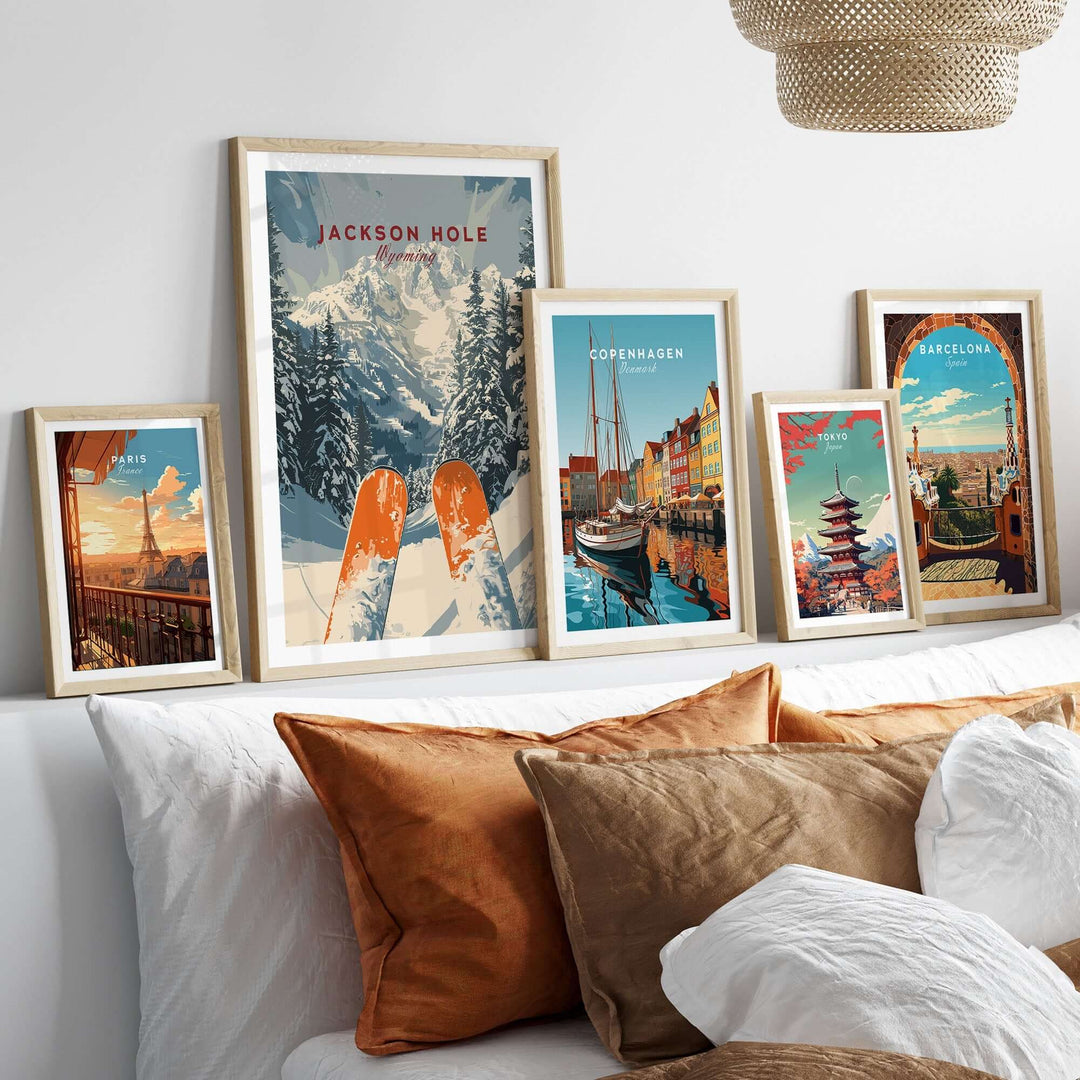 Jackson Hole travel poster among framed wall art featuring scenic destinations and cozy home decor.