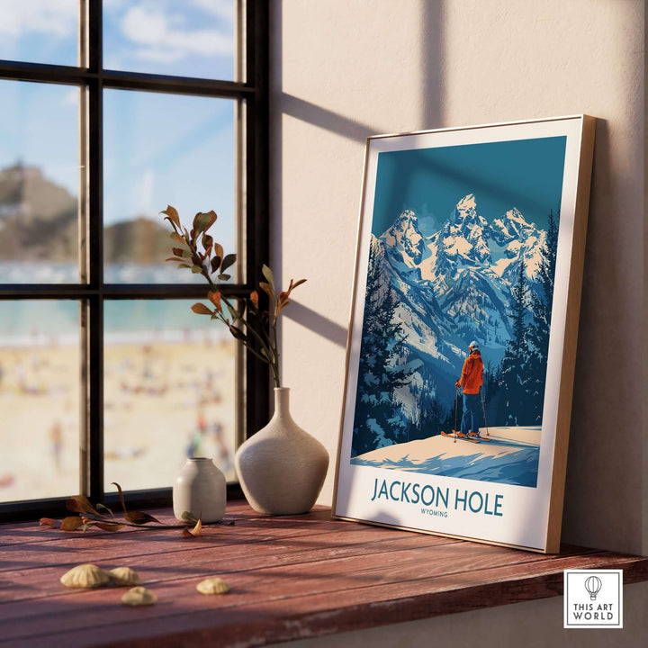 Jackson Hole wall art featuring a snowy mountain scene in Wyoming on a window sill with decorative vases.