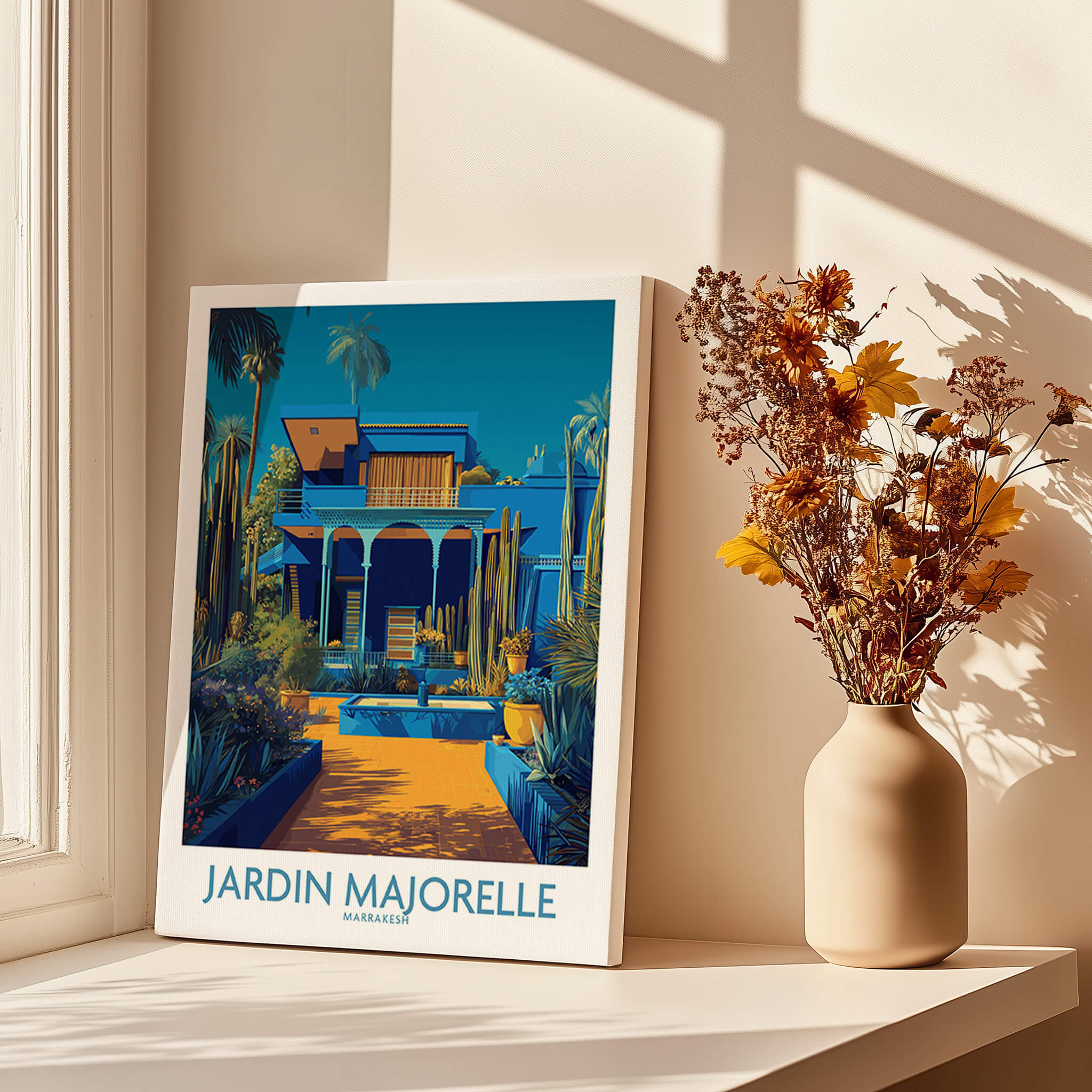Jardim Majorelle Marrakech Posters | Majorelle Blue Architecture Canvas Print displayed on a sunny windowsill with flowers.