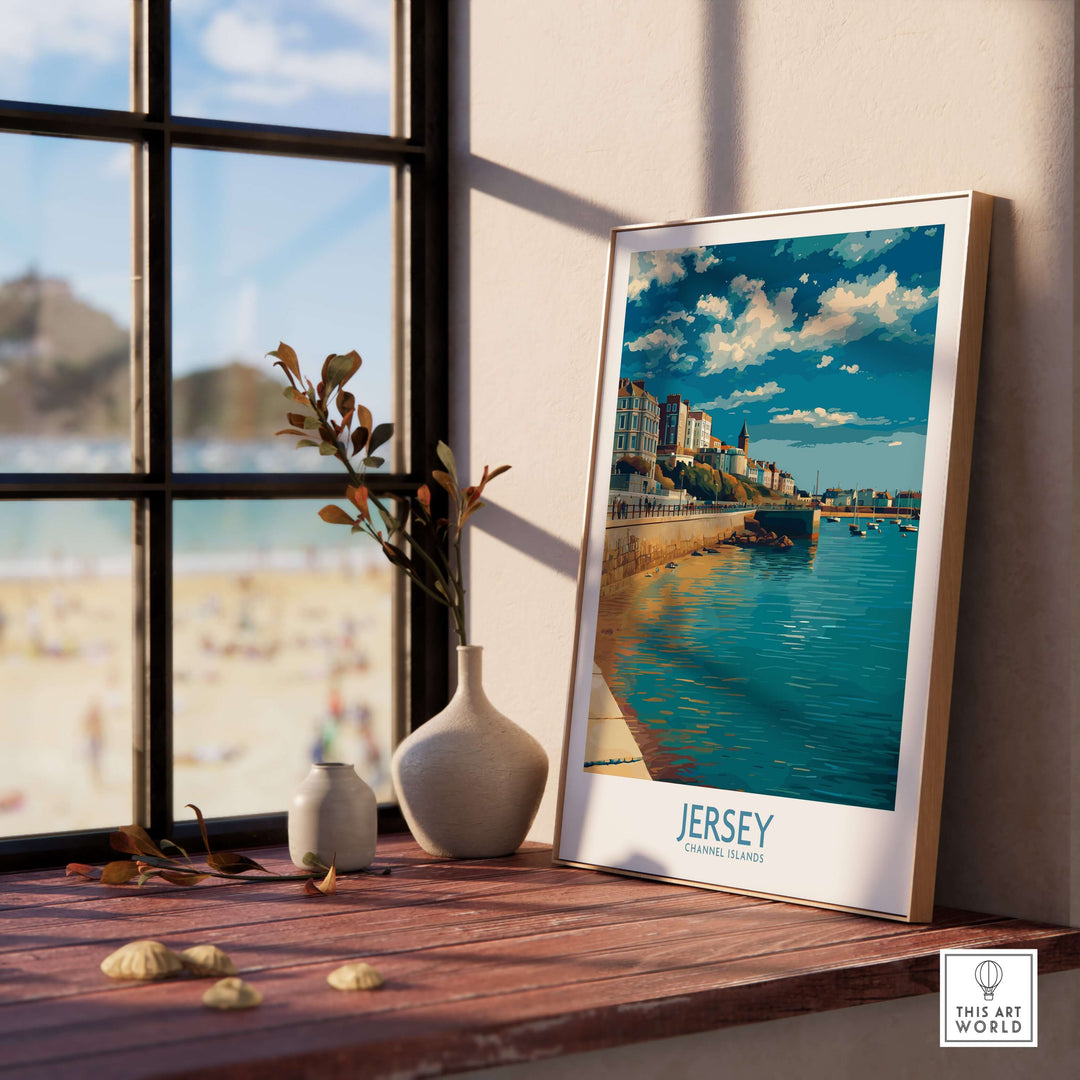 Jersey Channel Islands Harbour Promenade Art Print | St Helier Coastal Poster displayed by a window with a beach view.