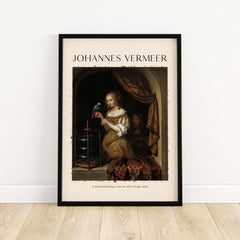Johannes Vermeer A Woman Feeding Parrot - Dutch Golden Age Art Print Poster framed art print on display.