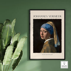 Johannes Vermeer Girl with a Pearl Earring 1665 Iconic Dutch Portrait Art Print framed on a green wall.