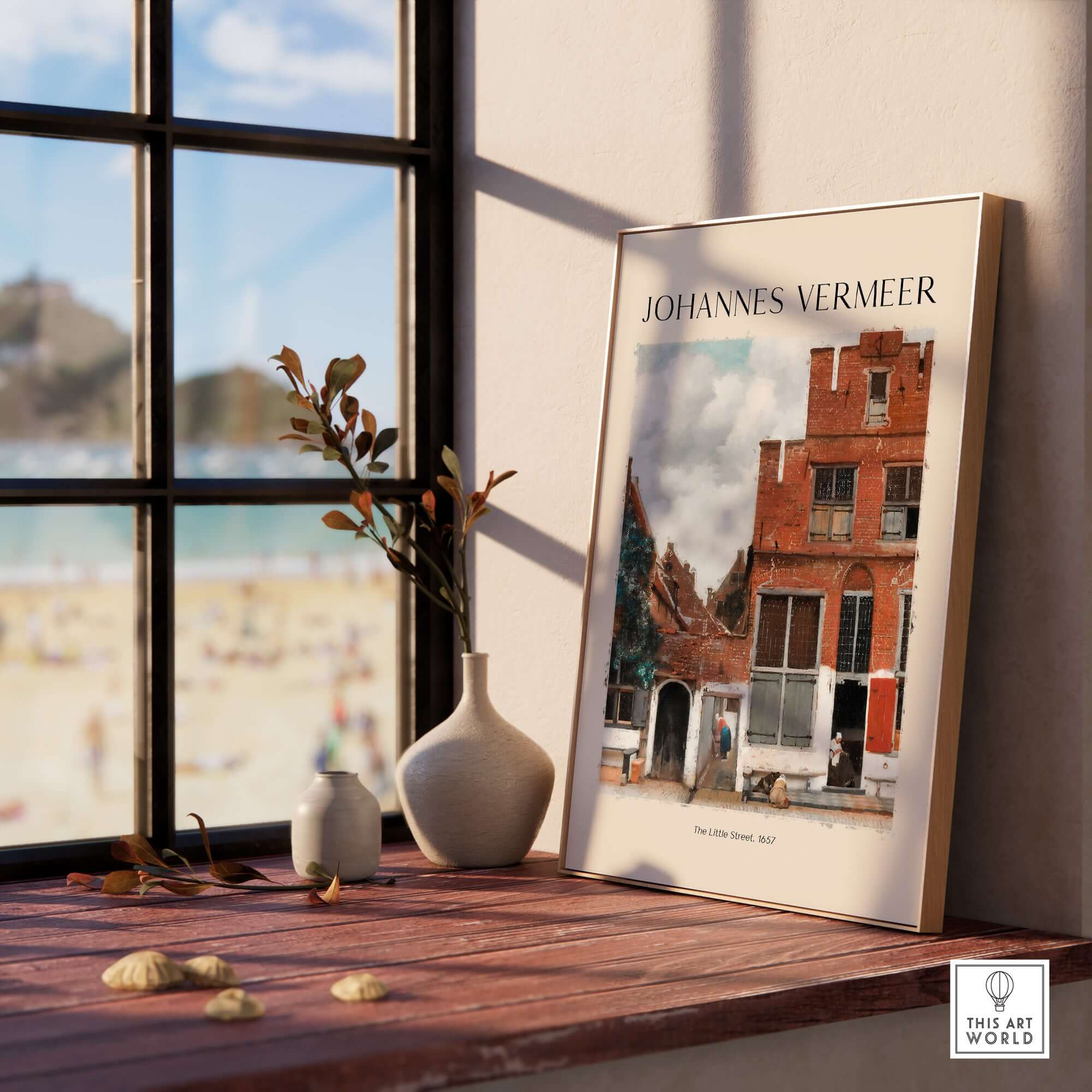 Johannes Vermeer The Little Street 1657 Delft Scene Dutch Golden Age Art Print displayed on a wooden table by a window.