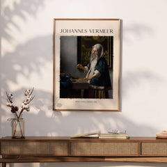 Johannes Vermeer Woman Holding a Balance 1662 Dutch Baroque Art Print Poster displayed on a stylish wall.