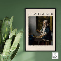 Johannes Vermeer Woman Holding a Balance 1662 Dutch Baroque Art Print Poster displayed on a green wall.