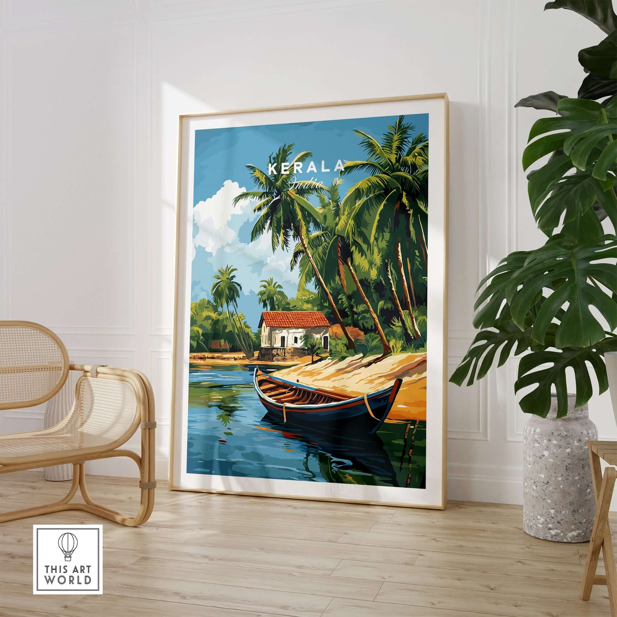 Kerala Travel Print India showcasing a vibrant landscape with palm trees and a traditional house framed in a stylish interior.