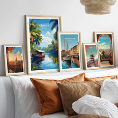 Kerala Wall Art India displayed in stylish frames above a cozy sofa with decorative cushions.