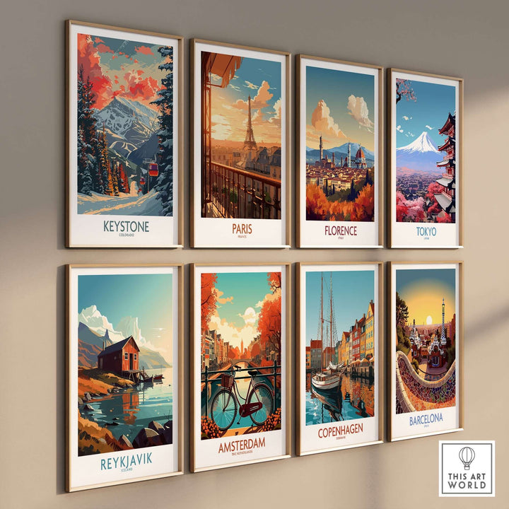 Gallery wall featuring framed posters of iconic cities including Keystone, Paris, Florence, Tokyo, Reykjavik, Amsterdam, Copenhagen, and Barcelona.