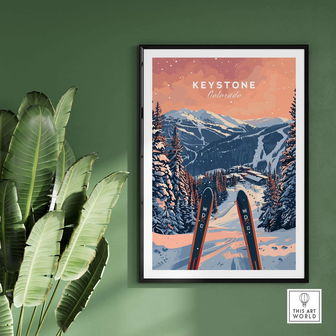 Keystone Ski Poster featuring snowy Colorado mountains and skis, framed on a green wall with plants. Perfect decor for ski enthusiasts.