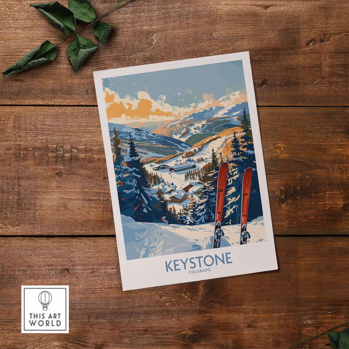 Keystone wall art poster featuring a Colorado ski print on a wooden table with green leaves.