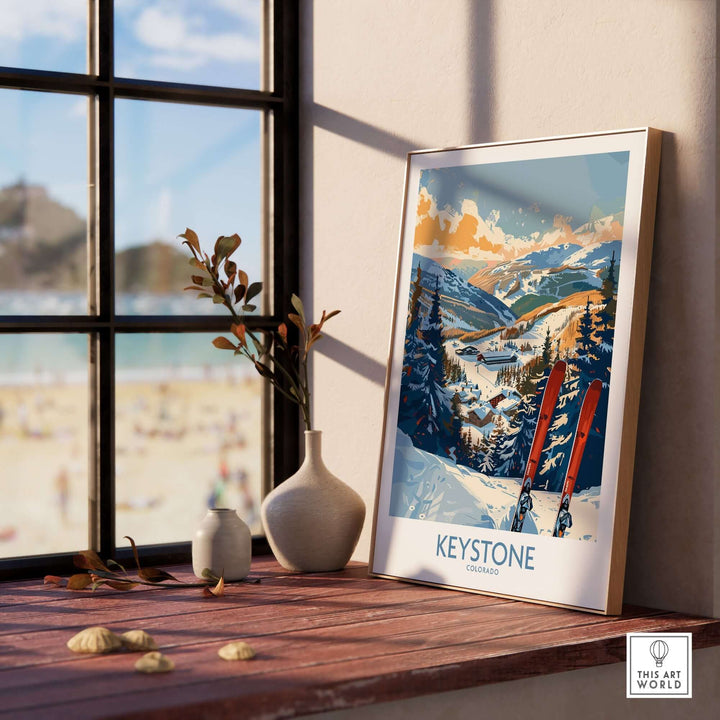 Keystone Wall Art Poster featuring a picturesque Colorado ski scene on a sunny day, displayed on a windowsill.