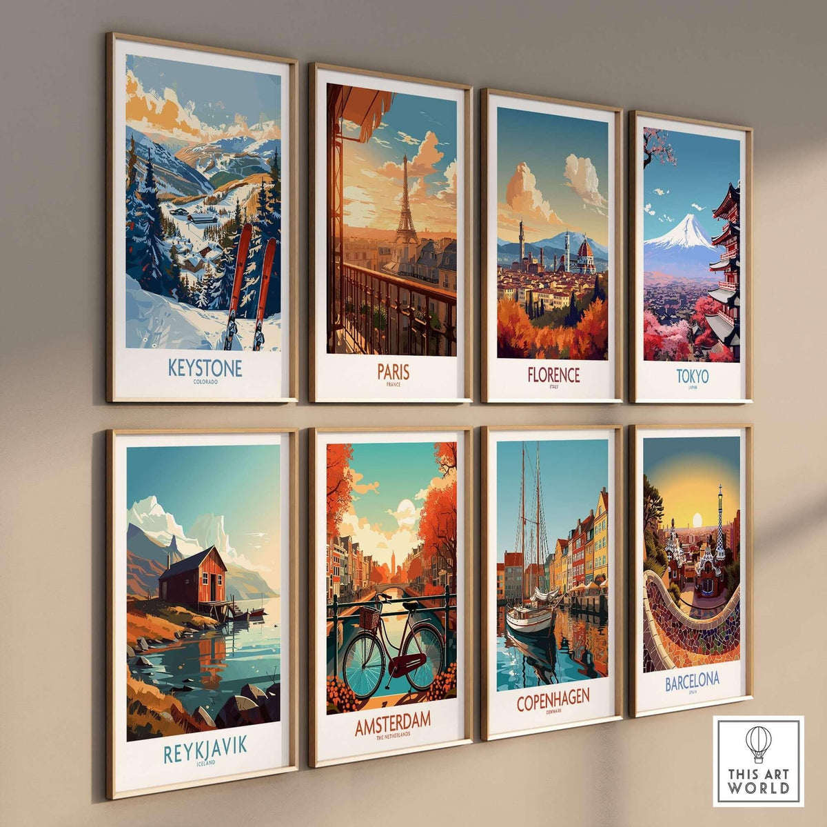 Wall art featuring travel posters of Keystone, Paris, Florence, Tokyo, Reykjavik, Amsterdam, Copenhagen, and Barcelona.