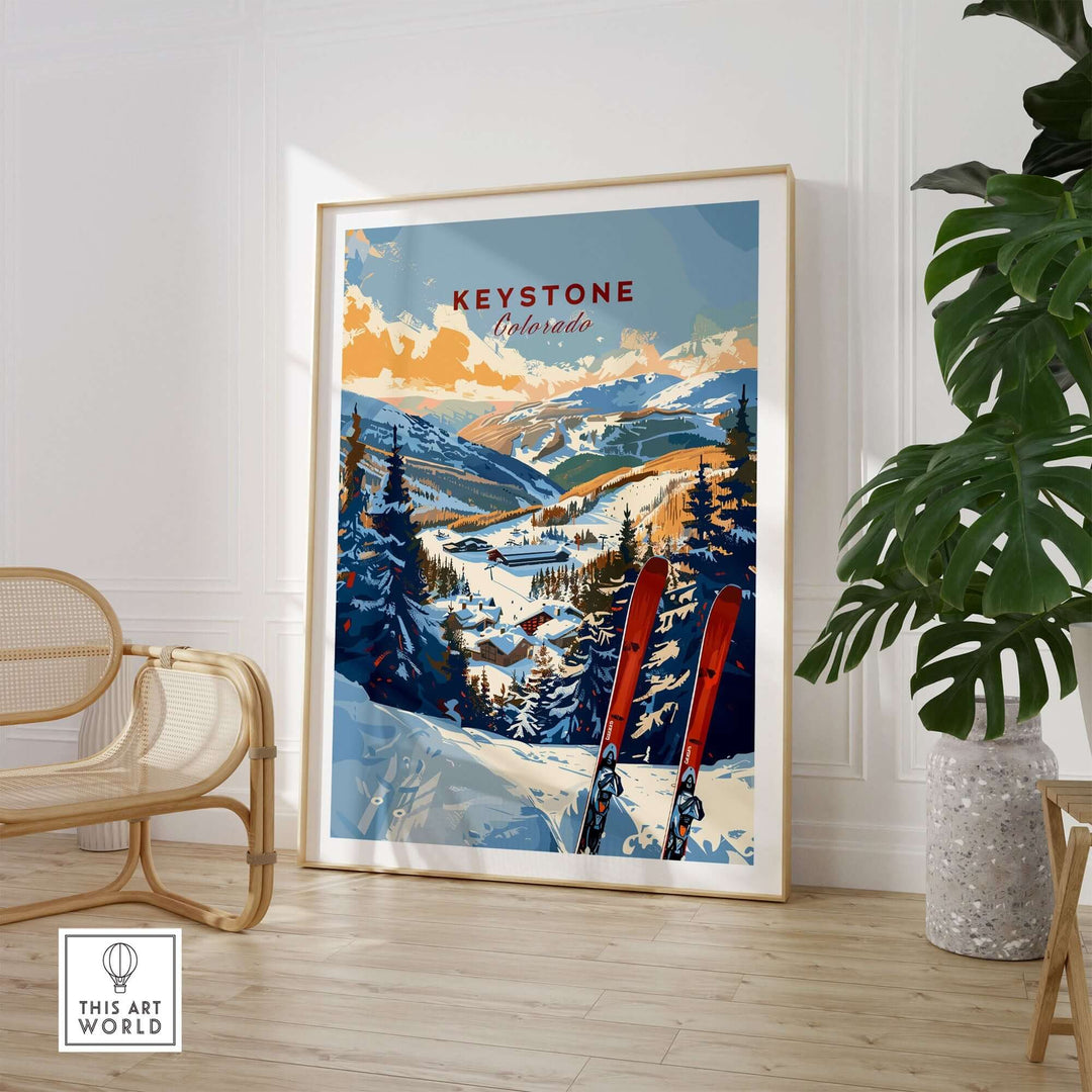 Keystone Colorado ski wall art print in modern living room setting, featuring snowy mountain landscape and ski gear illustration.