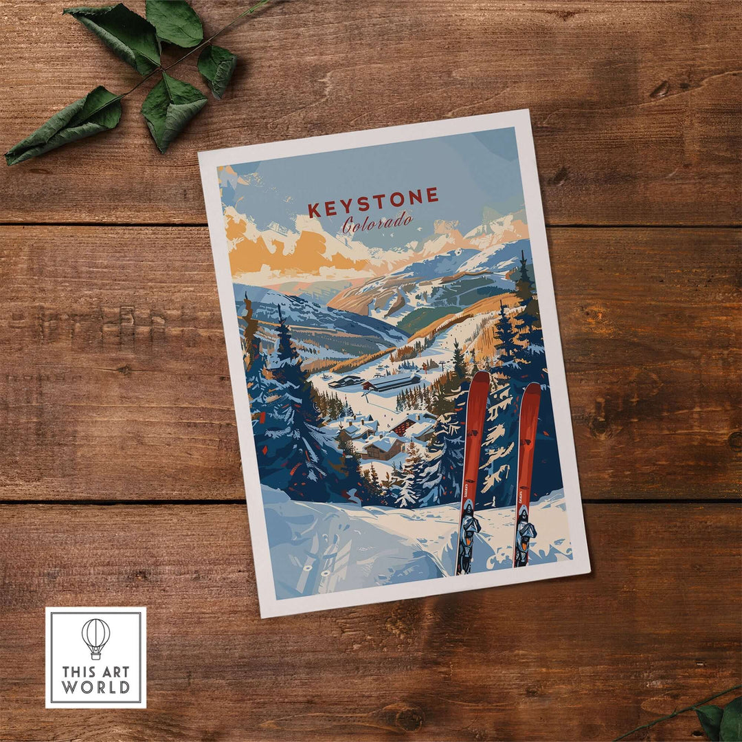 Keystone Colorado ski wall art print on wooden table, featuring snowy mountain landscape and vibrant winter colors.