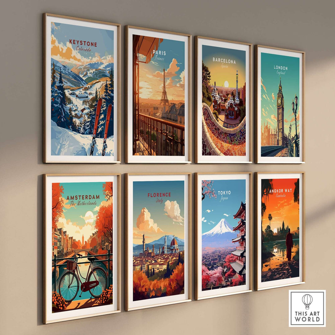 Gallery wall featuring colorful travel-themed posters of Keystone, Paris, Barcelona, London, Amsterdam, Florence, Tokyo, Angkor Wat