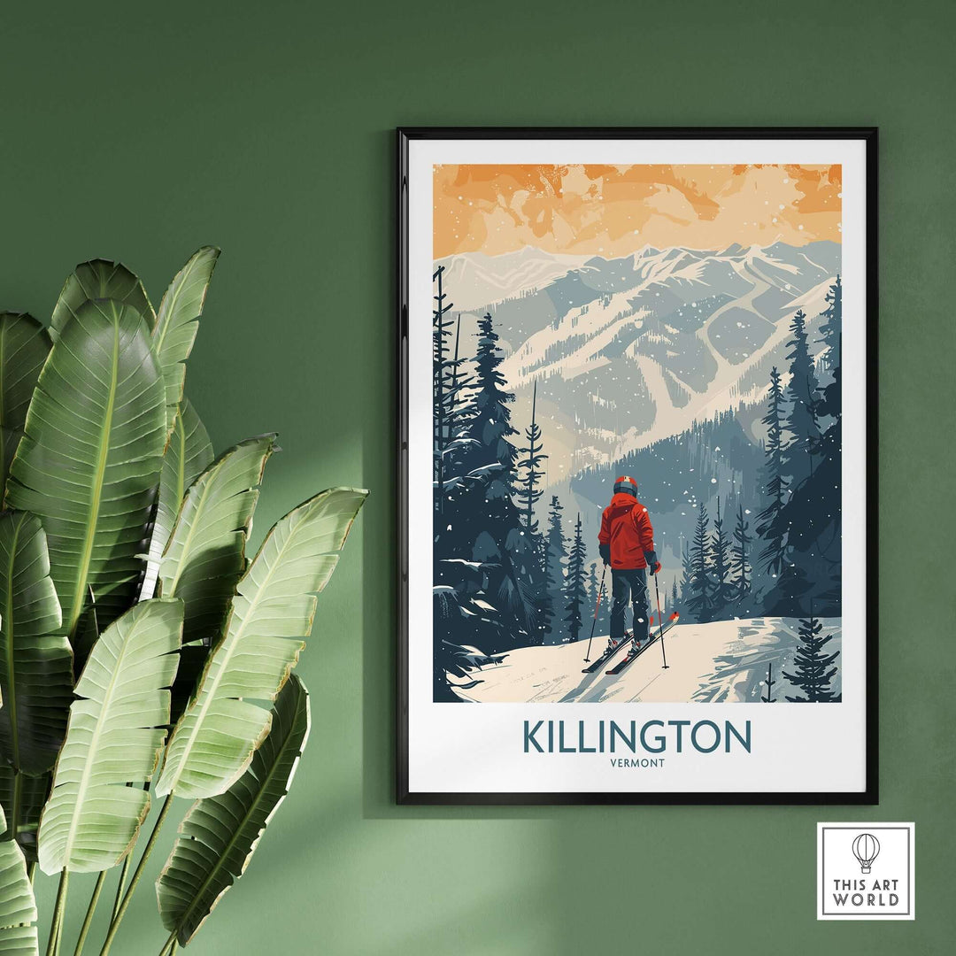 Ski poster of Killington, Vermont featuring a skier in red jacket with snow-capped mountains, framed on green wall with lush plant.