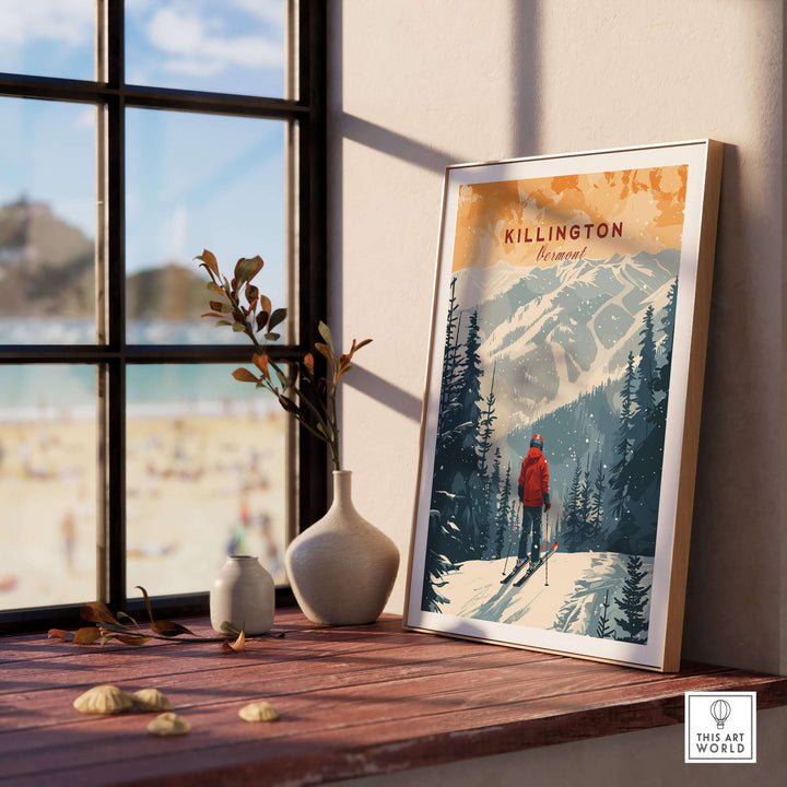 Framed Killington Vermont print displayed on a windowsill with scenic mountain artwork