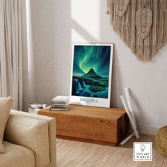 Kirkjufell Iceland Art Print | Waterfall Poster displayed in a modern interior with a wooden chest and comfortable sofa.