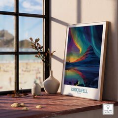 Kirkjufell Iceland Northern Lights Art Print | Aurora Borealis Mountain Poster framed by a window with a beach view.