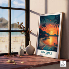 Koh Samui Thailand Print framed on a table, showcasing a sunset over the beach and palm trees.