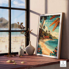 Koh Samui Wall Art displayed on a wooden table by a window, showcasing tropical beach landscape and vibrant colors.