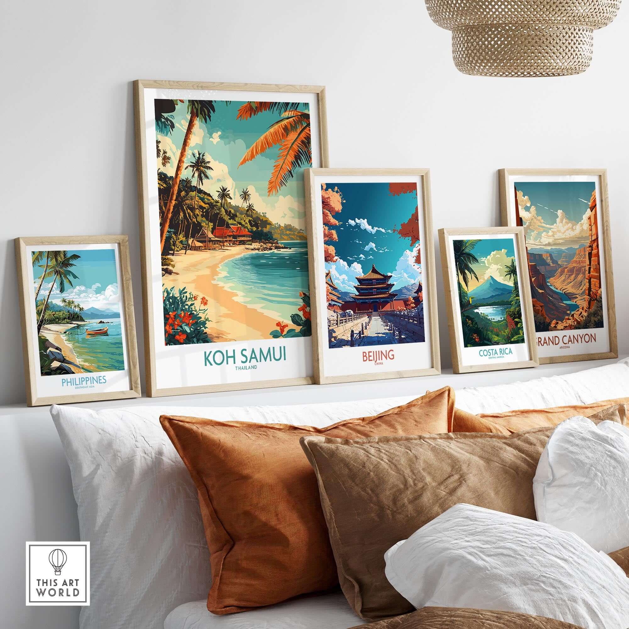Koh Samui Wall Art Print displaying vibrant tropical scenery among travel posters on a stylish shelf.