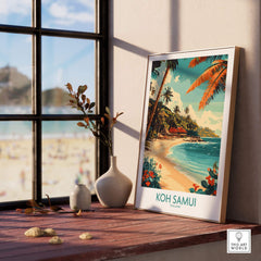 Koh Samui Wall Art Print displayed on a wooden table with beach view, showcasing vibrant colors and tropical ambiance.