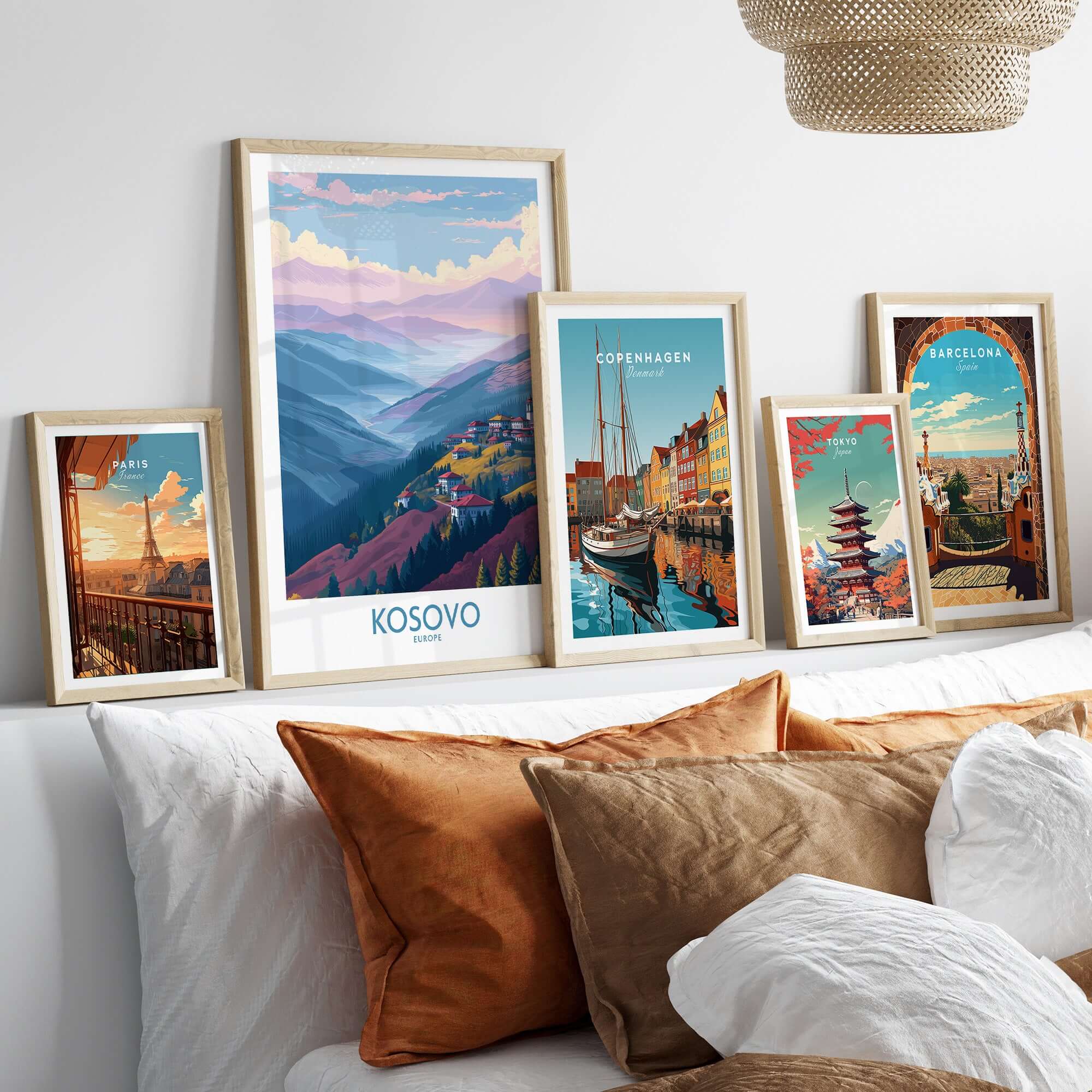 Kosovo Art Print | Pastel Landscape Poster displayed in modern frames on a stylish couch with decorative pillows.