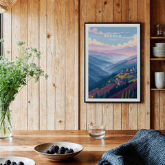 Kosovo Pristina Region Canvas Print | Balkan Home Decor displayed on a wooden wall with greenery and table decor.