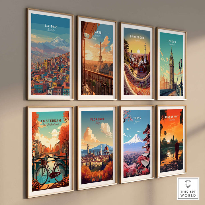Framed travel posters of La Paz, Paris, Barcelona, London, Amsterdam, Florence, Tokyo, and Angkor Wat on a wall.