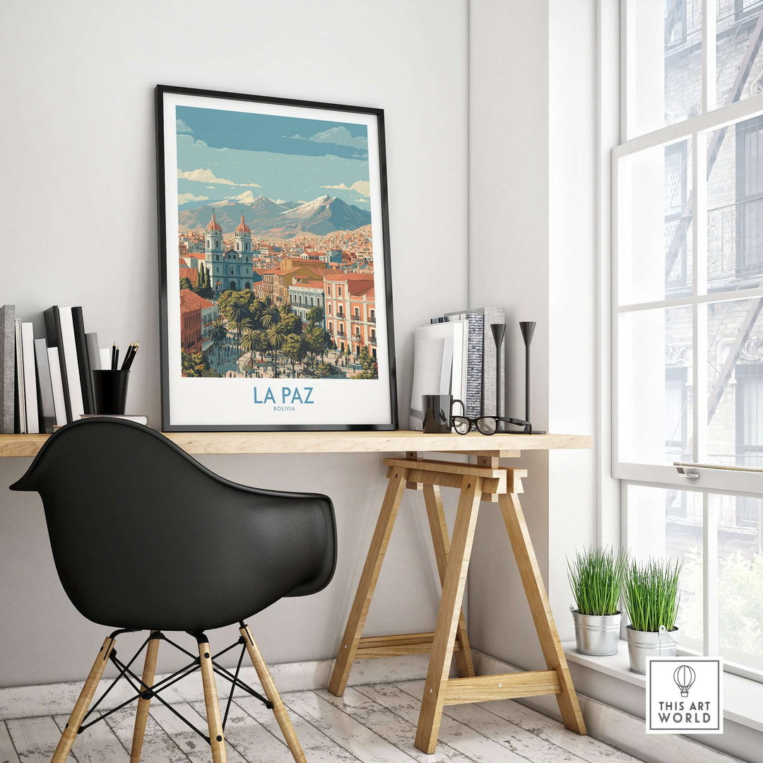 La Paz Bolivia wall art poster displayed in a modern workspace with a scenic city view and mountain backdrop.
