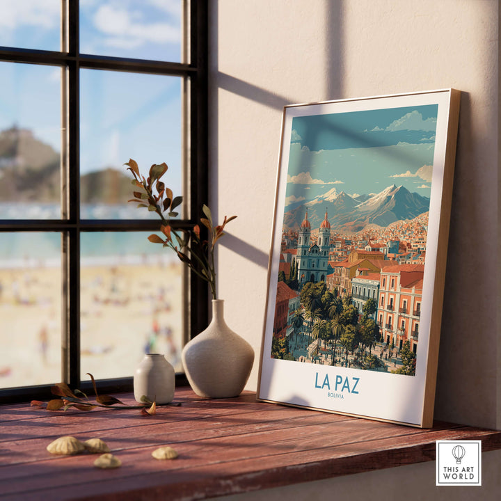 La Paz Bolivia wall art poster on a wooden table near a window, showcasing the vibrant city and mountains.