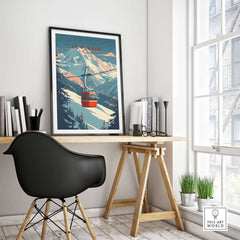 Stylish room with La Plagne Ski wall art print, featuring a scenic mountain and cable car, framed on a modern desk setup.