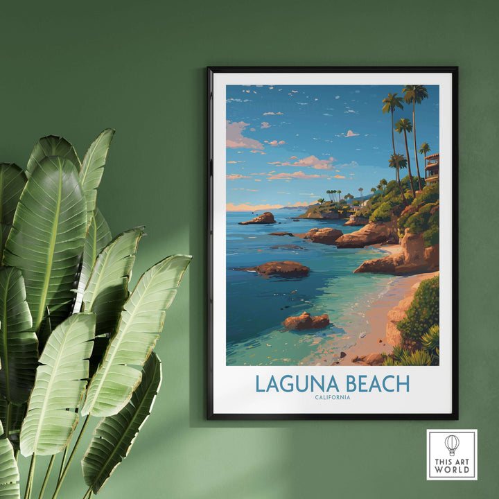 Laguna Beach California Coastal Cliff Art Print | Palm Tree Seascape Poster hanging on wall with tropical plants.