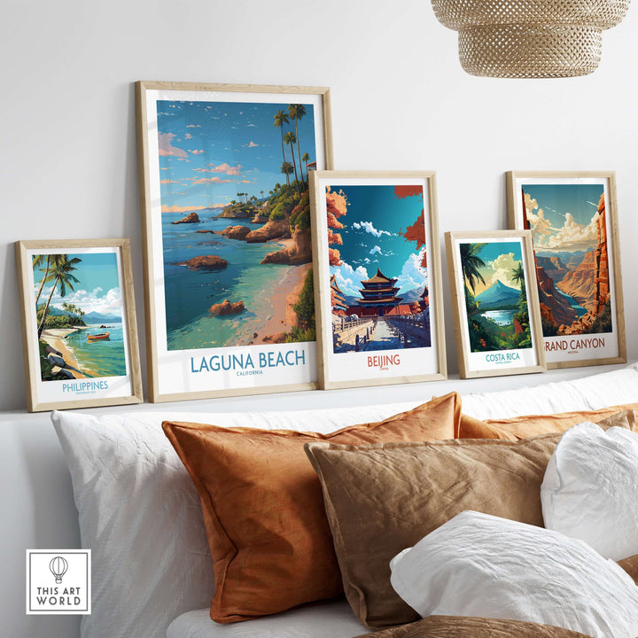 Laguna Beach California Coastal Cliff Art Print | Palm Tree Seascape Poster displayed among other framed travel art prints.