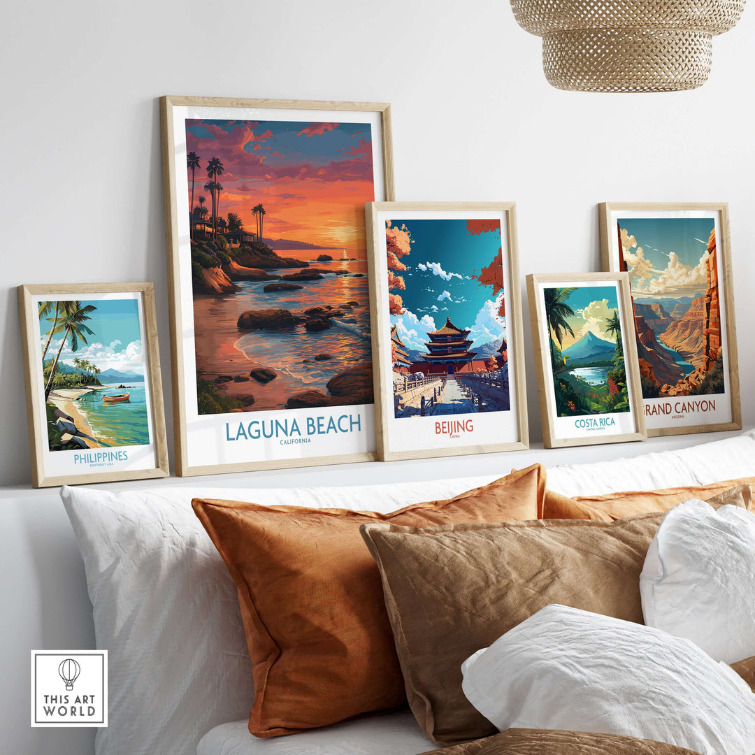 Laguna Beach California Sunset Art Print | Vibrant Coastal Poster displayed among other travel-themed art prints.