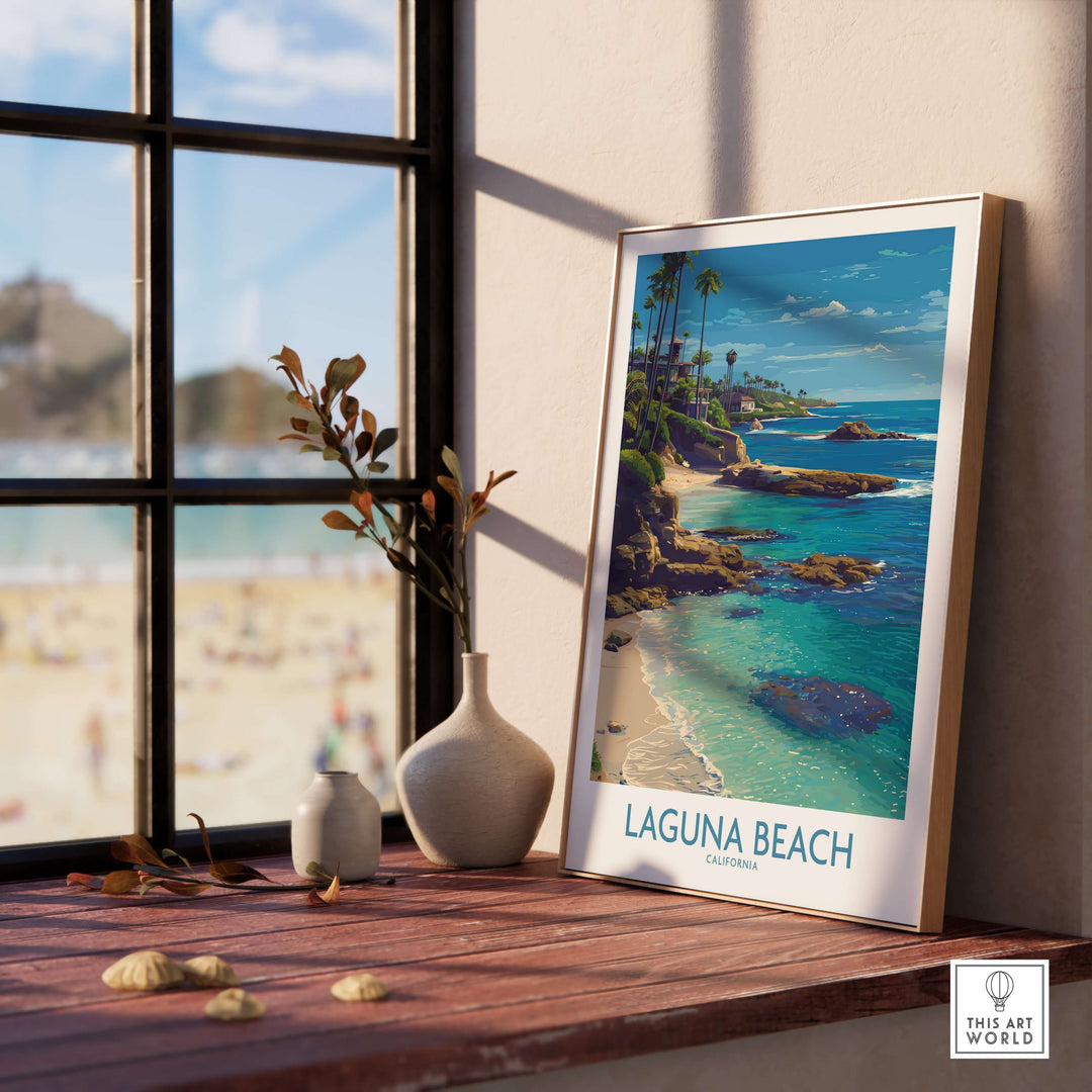 Laguna Beach California Turquoise Water Art Print | Clear Sea Travel Poster displayed on wooden table near window.