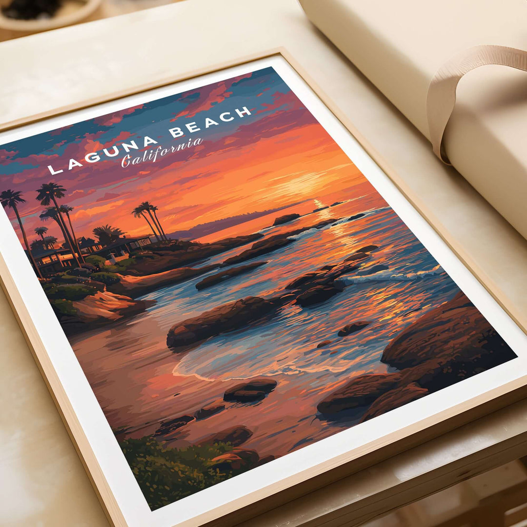 Laguna Beach Pacific Ocean Print showcasing a sunset over rocks and palm trees in California.
